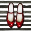 Picture of RED GLOSSY SHOES ON STRIPED BACKGROUND