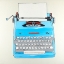Picture of BLUE TYPEWRITTER MACHINE