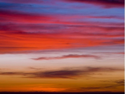 Picture of LOW ANGLE VIEW OF CLOUDS AT SUNSET