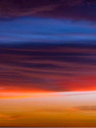 Picture of LOW ANGLE VIEW OF CLOUDS AT SUNSET