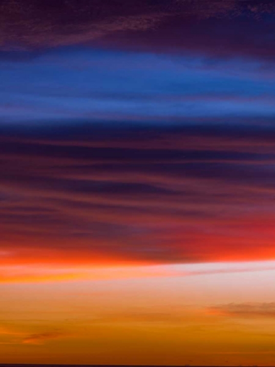 Picture of LOW ANGLE VIEW OF CLOUDS AT SUNSET