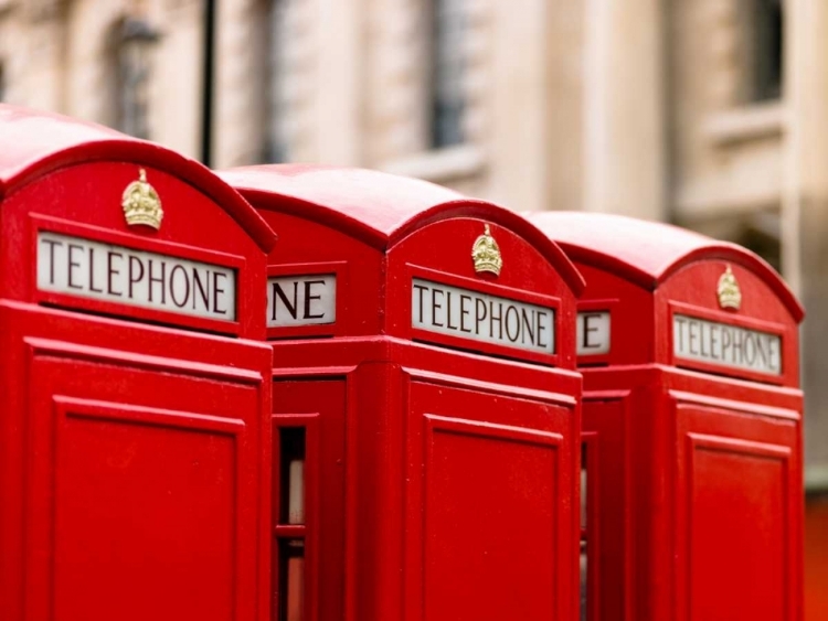 Picture of CLOSE-UP OF TELEPHONE BOX IN A ROW, ENGLAND