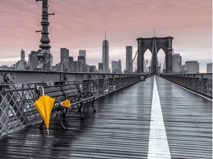 Picture of YELLOW UMBRELLA AND BUNCH OF ROSES ON BENCH ON PEDESTRIAN PATHWAY, BROOKLYN BRIDGE, NEW YORK