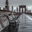 Picture of EMPTY BENCH ON THE PEDESTRIAN WALKWAY OF THE BROOKLYN BRIDGE, NEW YORK