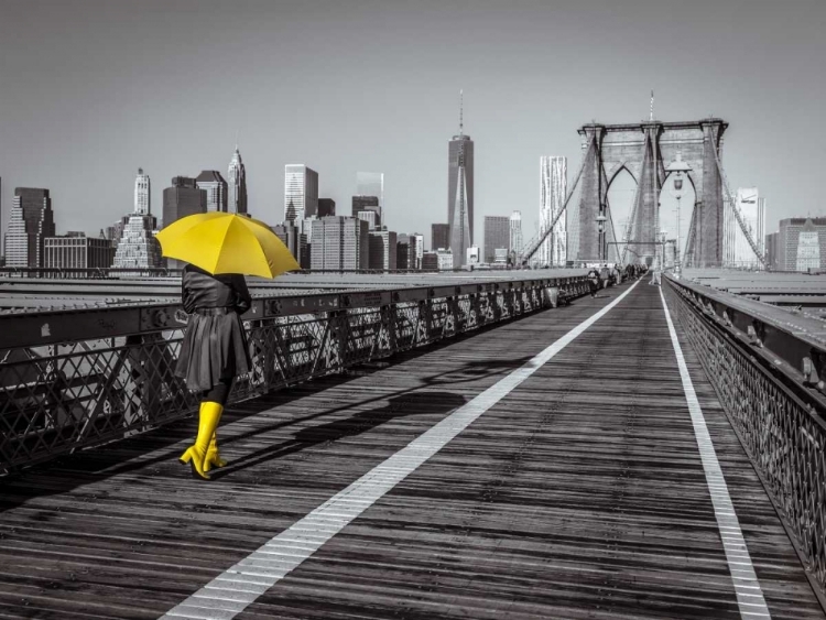 Picture of FEMALE TOURIST WITH UMBRELLA TAKING A WALK ON PEDESTRIAN WALKWAY ON BROOKLYN BRIDGE, NEW YORK