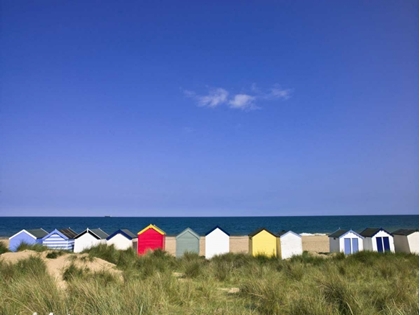 Picture of WODDEN FENCE AT BEACH WITH HUTS IN THE BACKGROUND