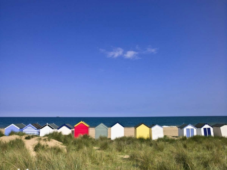 Picture of WODDEN FENCE AT BEACH WITH HUTS IN THE BACKGROUND