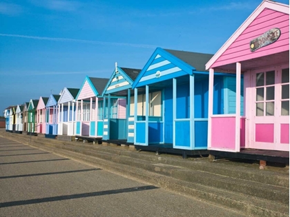 Picture of BEACH HUT IN A ROW AGAINST BLUE SKY