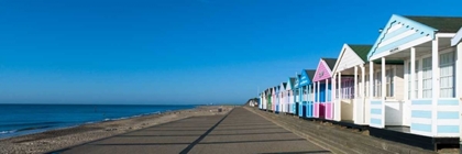 Picture of BEACH HUTS IN A ROW AGAINST BLUE SKIES