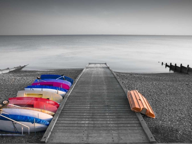 Picture of KAYAKS ON THE SIDE OF PIER