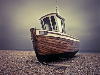 Picture of BOAT MOORED ON PEBBLED BEACH