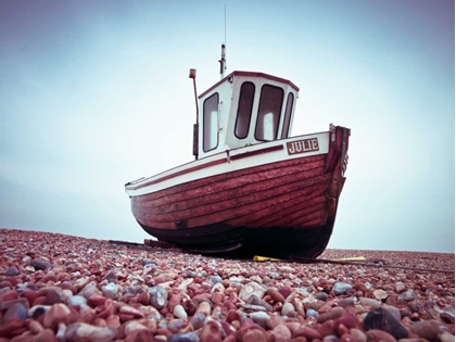 Picture of BOAT MOORED ON PEBBLED BEACH
