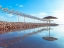 Picture of PARASOL AND JETTY ON DEAD SEA, ISRAEL