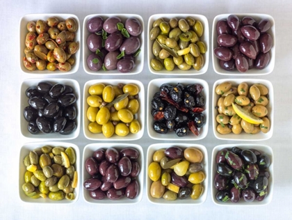 Picture of VARIETIES OF OLIVES IN BOWLS ON WHITE BACKGROUND