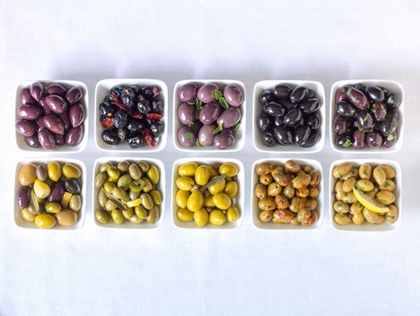 Picture of VARIETIES OF OLIVES IN BOWLS ON WHITE BACKGROUND