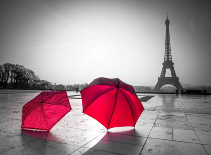 Picture of TWO UMBRELLAS IN FRONT OF THE EIFFEL TOWER, PARIS, FRANCE