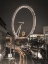 Picture of NIGHT SHOT OF LONDON STREET WITH MILLENNIUM WHEEL IN BACKGROUND