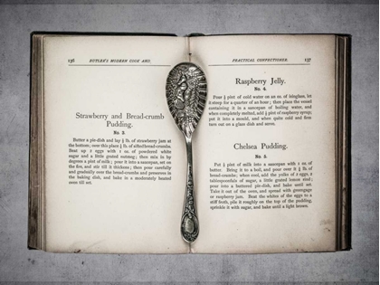 Picture of OLD COOKERY BOOK OPEN WITH AN OLD JAM SPOON