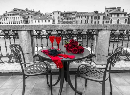 Picture of BUNCH OF ROSES WITH WINE GLASSES AND FEMALE HAND GLOVES ON CAFE TABLE, VENICE, ITALY
