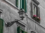 Picture of LAMP ON AN OLD BUILDINGS IN CITY OF ROME, ITALY