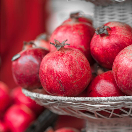 Picture of POMEGRANATES IN BASKET