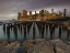 Picture of MANHATTAN SKYLINE WITH ROWS OF GROYNES IN EAST RIVER, NEW YORK