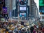Picture of COMMUTERS ON BUSY BROADWAY IN NEY YORK CITY NEAR TIMES SQUARE