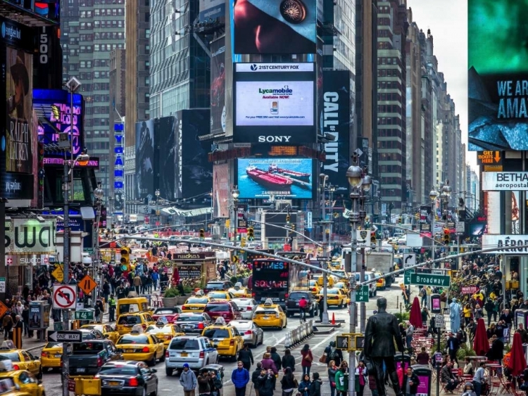 Picture of COMMUTERS ON BUSY BROADWAY IN NEY YORK CITY NEAR TIMES SQUARE