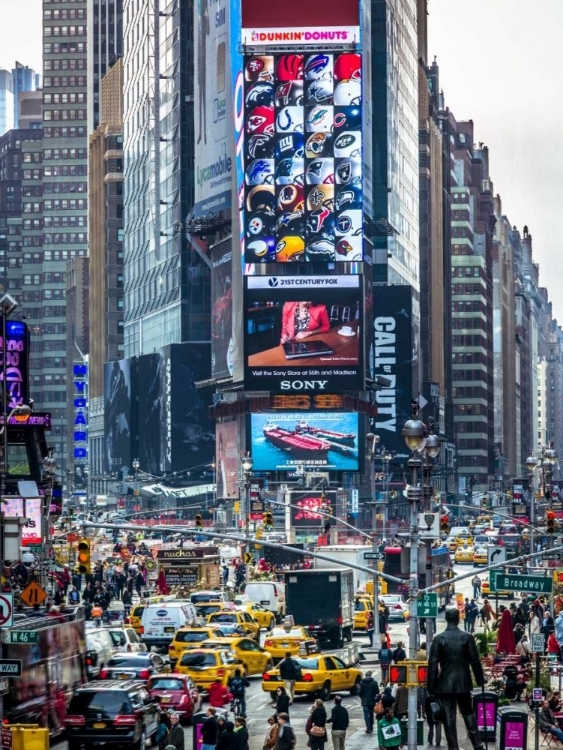 Picture of COMMUTERS ON BUSY BROADWAY IN NEY YORK CITY NEAR TIMES SQUARE