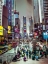 Picture of COMMUTERS ON BUSY BROADWAY IN NEY YORK CITY NEAR TIMES SQUARE