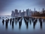 Picture of LOWER MANHATTAN SKYLINE WITH PIER PILINGS IN EAST RIVER, NEW YORK, USA