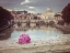 Picture of BUNCH OF ROSES ON BRIDGE WITH BASILICA DI SAN PIETRO IN VATICAN, ROME, ITALY