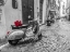 Picture of OLD SCOOTER WITH BUNCH OF ROSES ON NARROW STREET OF ROME