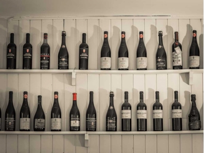 Picture of OLD WINE BOTTLES ON WOODEN SHELF