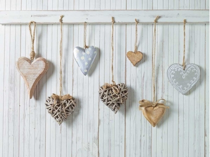 Picture of HEARTS HANGING ON WOODEN BACKGROUND