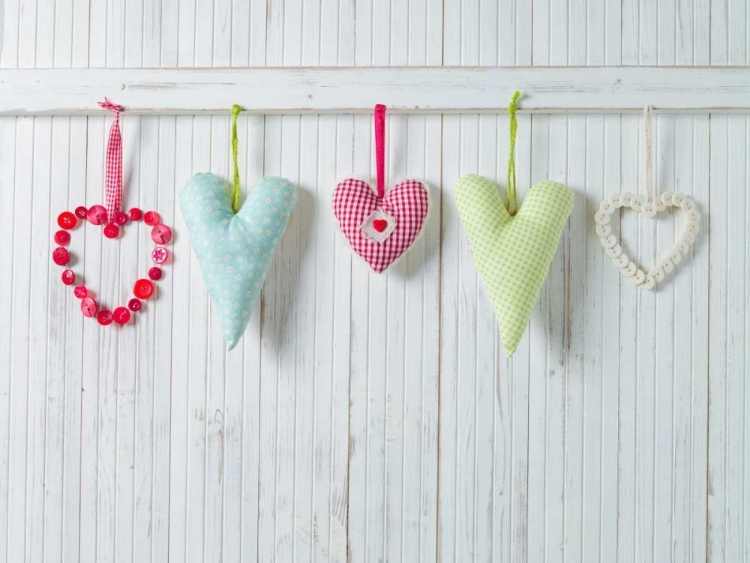 Picture of HEARTS HANGING ON WOODEN BACKGROUND