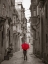 Picture of TOURIST WITH UMBRELLA AT NARROW STREET ON BIRGU, MALTA