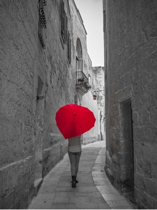 Picture of TOURIST WITH HEART SHAPED UMBRELLA WALKING THROUGH NARROW STREET OF MDINA, MALTA