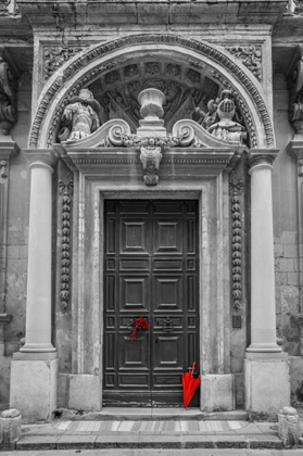 Picture of BUNCH OF ROSES WITH UMBRELLA ON DOOR OF A BUILDING IN MDINA, MALTA