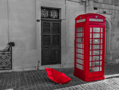 Picture of RED UMBRELLA AND TELEPHONE BOX ON STREET OF MARSAXLOKK, MALTA