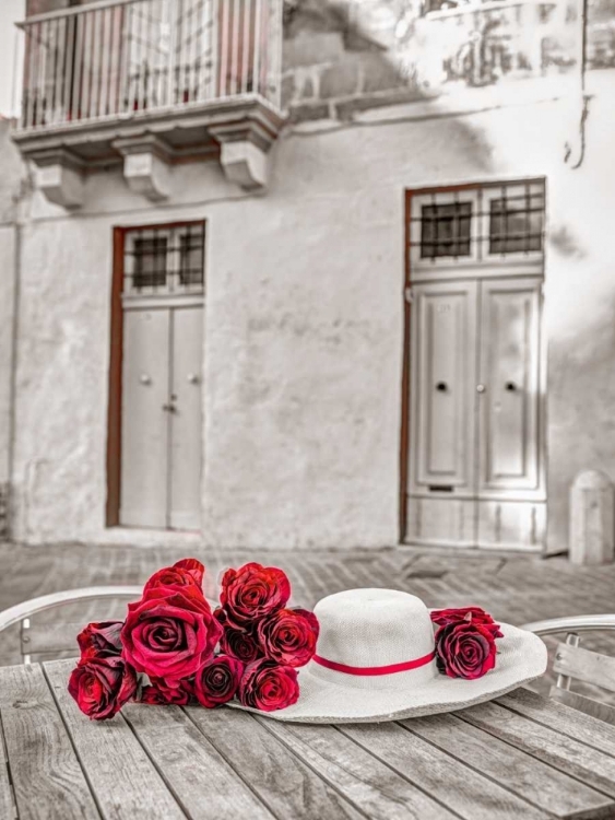 Picture of FEMALE HAT WITH BUNCH OF ROSES ON CAFE TABLE, MALTA