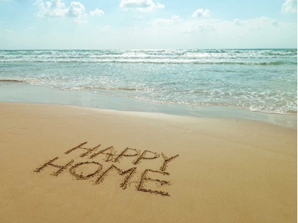 Picture of HAPPY HOME WRITTEN IN SAND ON THE BEACH