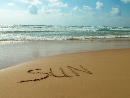 Picture of WORD SUN WRITTEN IN SAND ON THE BEACH
