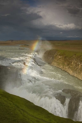Picture of ICELAND A RAINBOW ARCS OVER GULLFOSS FALLS