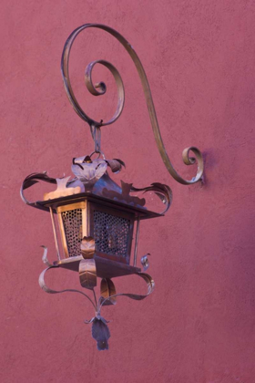 Picture of MEXICO COPPER LAMP HUNG FROM PINK-PURPLE WALL