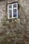 Picture of ICELAND, AKUREYRI WINDOW OF AN OLD STONE HOUSE