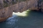 Picture of NEW ZEALAND, SOUTH ISLAND SUNLIGHT ON SEA ARCH