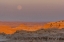 Picture of SD, BADLANDS NP MOONRISE OVER RUGGED LANDSCAPE