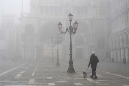 Picture of ITALY, VENICE A MAN WALKS HIS DOG IN FOG