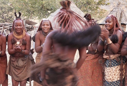 Picture of NAMIBIA, OPUWO HIMBA WOMAN DURING A DANCE